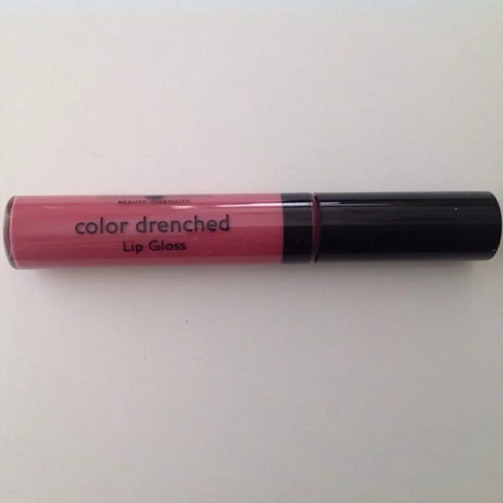 Laura Geller Color Drenched Lip Gloss in Perked Up Pink: a smooth rosy p…